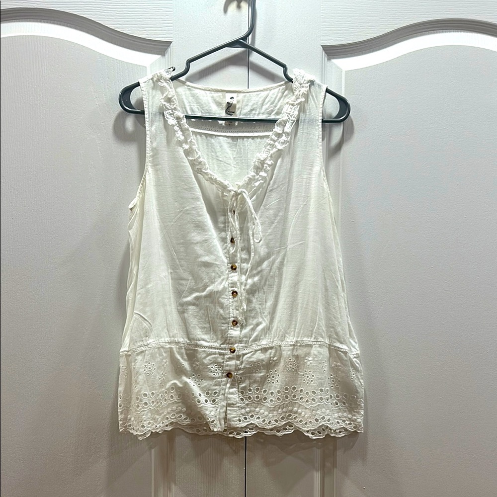 Floreat Sleeveless Ruffled Blouse